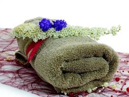 flowers lie on a green towel