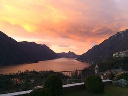 gorgeous sunset above mountain lake