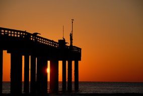 outdoor fishing pier on sunset in Florida