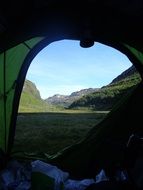 mountain landscape framed with tent, Norway