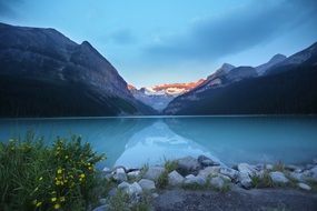 lake with blue water near the mountain