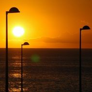 street lights on sunset background