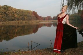blonde Girl Lake Autumn Forest landscape