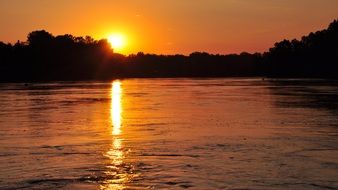 Romantic mood on a river at the sunset