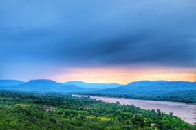 distant view of a large river among the picturesque landscape