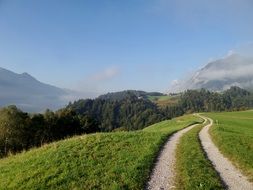 dirt road among picturesque panoramic landscape