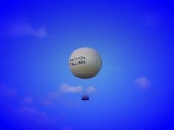 hot air balloon in bright blue sky, tallinn, estonia