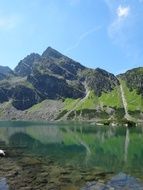 black pond in the Tatras on a sunny day