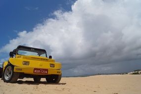 yellow buggy in the desert