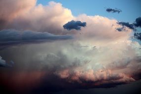 sun behind the pink clouds