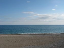 sandy beach at calm sea, turkey, antalya