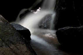 photo of slow motion of a waterfall