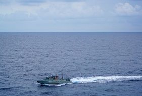 Floating boat on a caribbean ocean