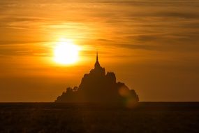 silhouette of Mont St Michel abbey at Sunset Sky, france, brittany