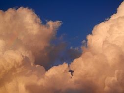 rainbow in the fluffy clouds