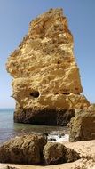 beige rock on the coast at Beira Mar Beach, Portugal