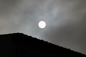 foggy sun over the mountain