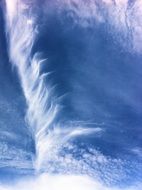 cirrus clouds on the deep blue sky