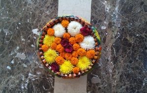basket with autumn flowers at the festival