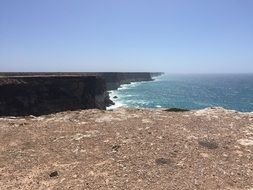 view of the blue ocean from the cliff