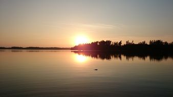 Landscape of lake and forest at the sunset