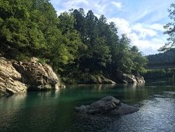 river in a valley in japan
