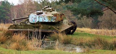 old tank in the autumn forest