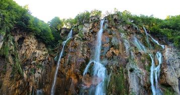 Waterfall on Cliff Flowing summer scene