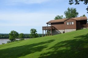 wooden house on a river bank in Illinois