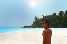 tanned sexy man on the beach in India