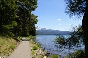 narrow path by the lake in the highlands