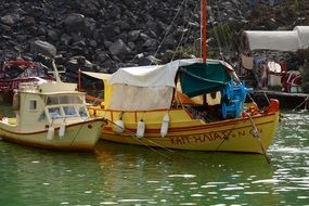 colorful Fishing Boats on water at coast, Greece