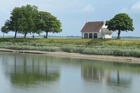 house near the river in france
