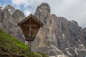 landscape of wooden Cross near the mountains