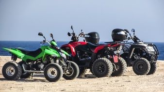 Three ATVs on the beach in Cyprus