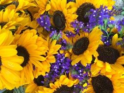 bouquet with sunflowers and small purple flowers