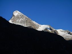 white tooth mountains behind the mountain