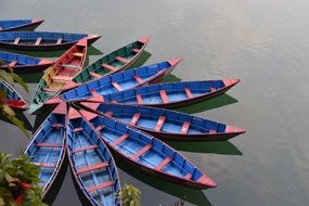 boats on the lake like the petals of a big flower