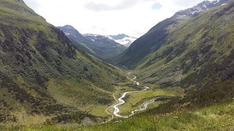 green mountain valley in switzerland