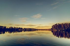 yellow sunset over a lake in the mazury region of poland
