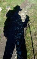 shadow of a backpacker with a backpack