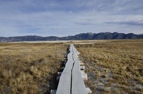 wooden trail in a desert in california