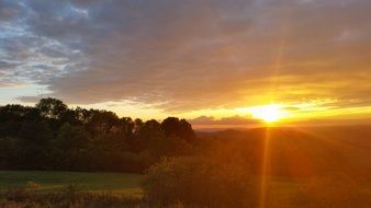 Landscape with the sunset in the evening sky