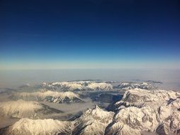 mountains in austria under blue sky