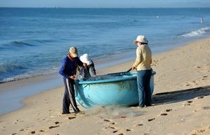 fishermen on the coast of vietnam
