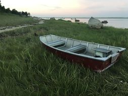 Empty boat on a grass