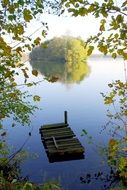 a raft on a lake among the trees