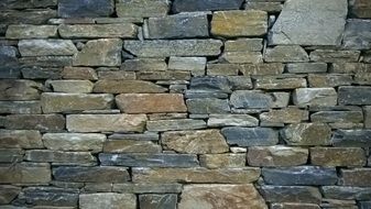 stone wall of a building in greece