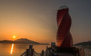 modern building on the lake at dawn