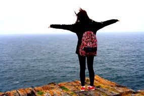girl on the peak of the mountain